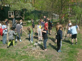 Pupils clearing the ground
