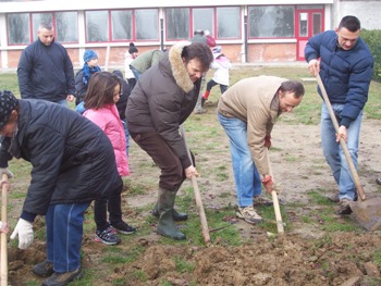 spading the soil for weath