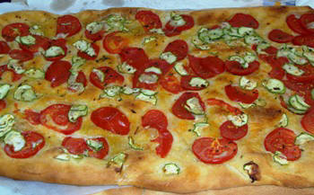 Schiacciata with courgettes and tomatoes